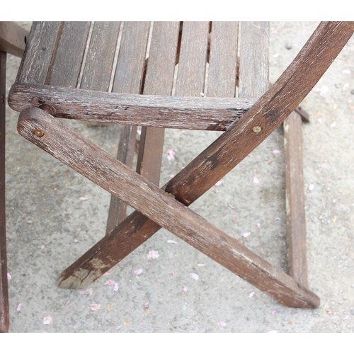 327 - Wooden garden table and 4 chairs