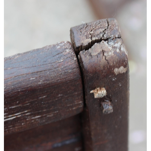 327 - Wooden garden table and 4 chairs