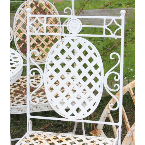 343 - Vintage white painted metal garden table with 4 folding chairs