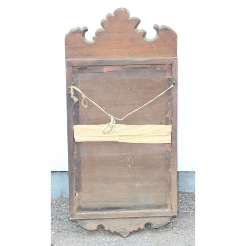 412 - Antique wooden framed mirror with impressive gilt decoration