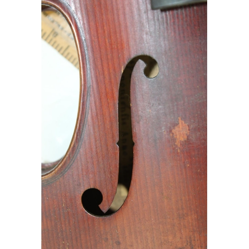 654 - After Gaspard Duiffo - An excellent quality violin with carved male head and marquetry inlaid back, ... 