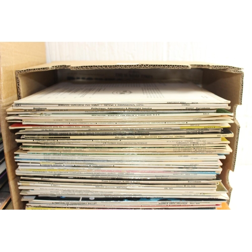 657 - 2 boxes of assorted vinyl records, mainly LPs