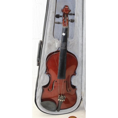 659 - 2 violins, one with case & 2 bows