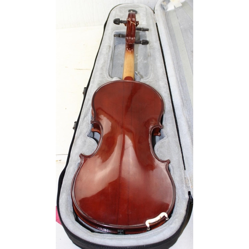 659 - 2 violins, one with case & 2 bows