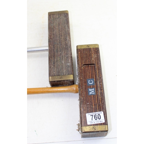 760 - A pair of unusual brass bound laminated wooden croquet mallets