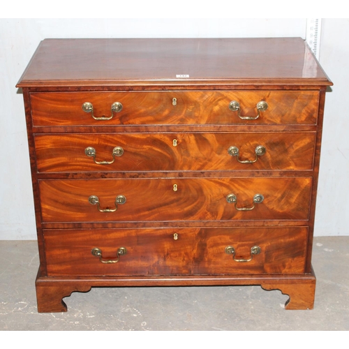 142 - An antique 4 drawer Mahogany chest of drawers standing on bracket feet