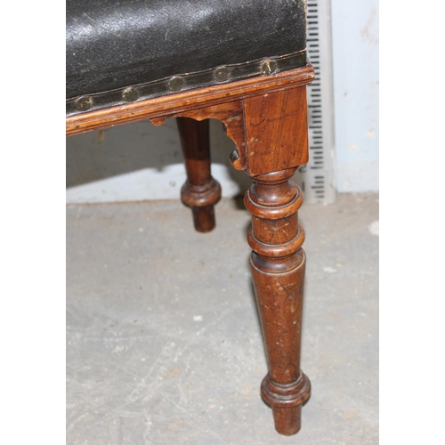 146 - Victorian leather topped stool standing on 4 turned legs