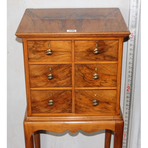 149 - A 20th century Walnut 6 drawer collectors chest on stand with brass handles