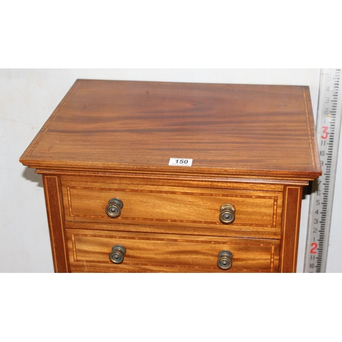 150 - An early 20th century mahogany 4 drawer collectors chest on long straight legs