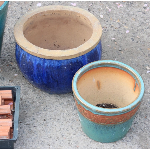 353 - Qty of assorted glazed garden pots and feet etc