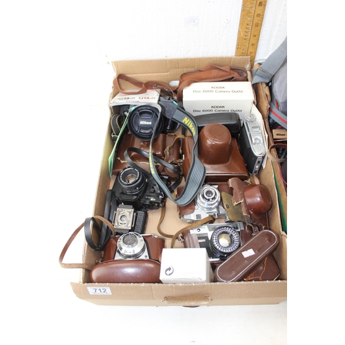 712 - 3 boxes of assorted cameras, camera related items and vintage photographic lighting etc