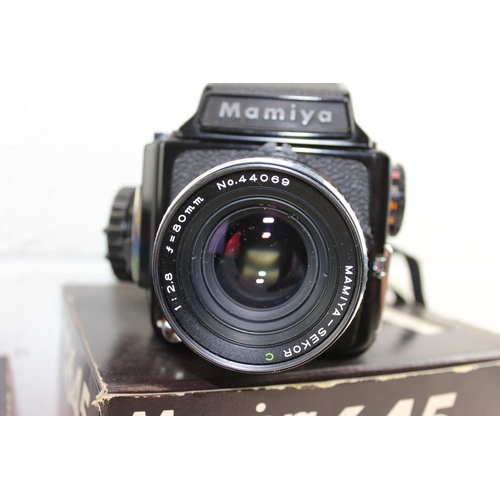 715 - Mamiya M645 camera with 1:2.8 f=80mm lens in original box with boxed Prism finder and a Mamiya-Sekor... 