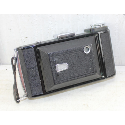 717 - Zeiss Ikon folding camera with Novar 1:4.5 f=11cm lens, in leather case