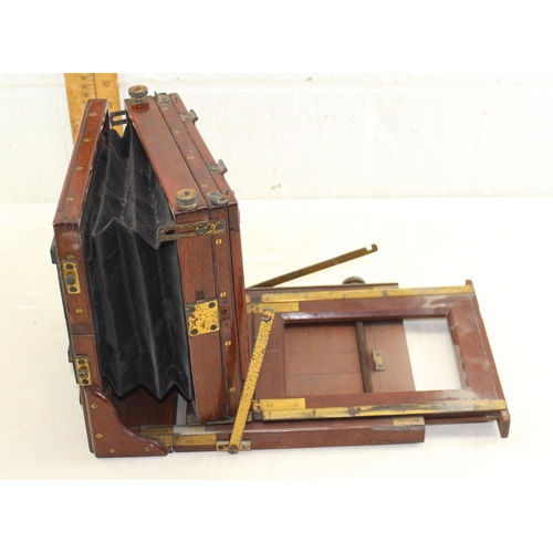 722 - An early 20th century wooden cased plate camera by W. Watson of High Holborn, London with Dallmeyer ... 