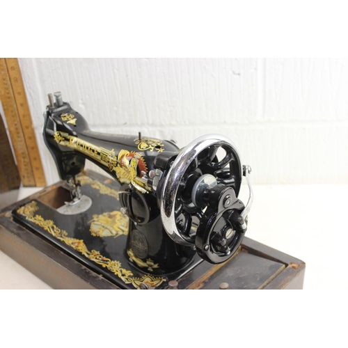 888 - Antique Rudge sewing machine in wooden case