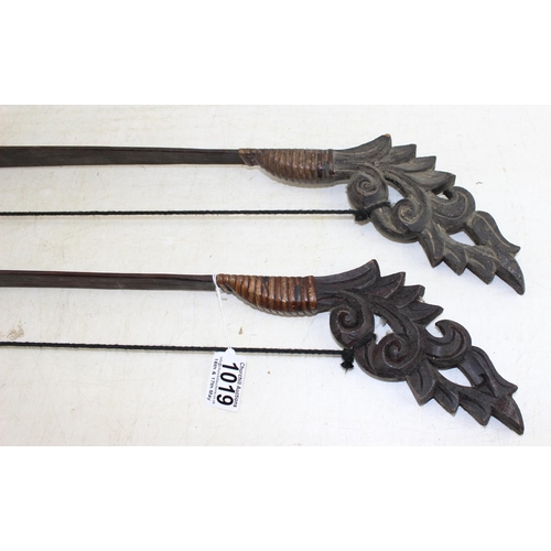 1019 - 2 Asian carved wooden archery bows