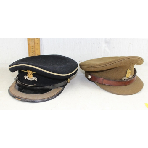 1023 - A large qty of assorted uniform, caps, paperwork in original tin trunk relating to Major A.F. Dibben... 