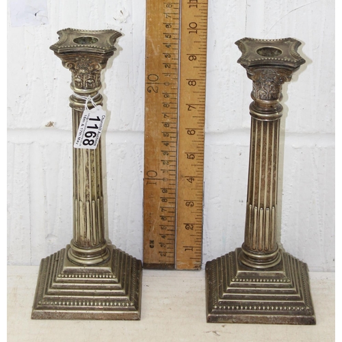 1168 - A pair of silver plated candlesticks formed as Corinthian columns