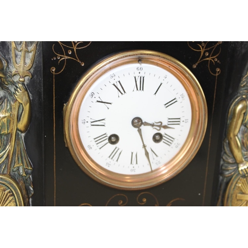 1418 - A large antique slate cased mantle clock with key and pendulum, the case mounted with gilt figures o... 