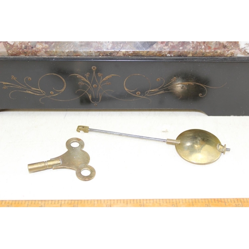 1418 - A large antique slate cased mantle clock with key and pendulum, the case mounted with gilt figures o... 