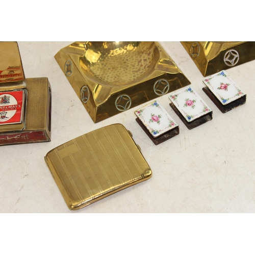 1696 - 2 Secessionist brass ashtrays, gold plated cigarette case, 3 enamel match box holder and an unusual ... 