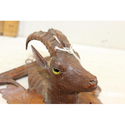 290 - Antique Black Forest carved wooden wall plaque formed as an Ibex with glass eyes and a house box