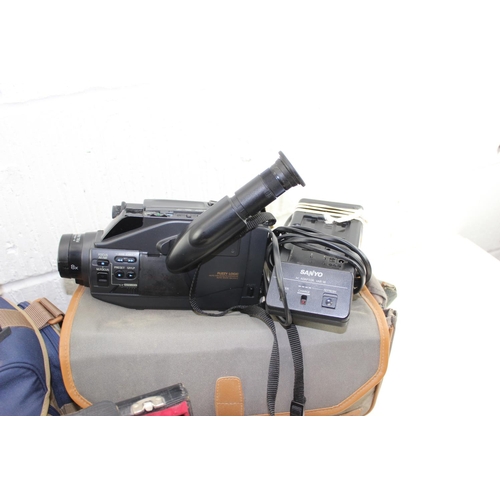 727 - Sony camcorder in carry case together with a Sanyo in a carry case and a Bell and Howell cine camera... 