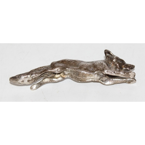 1173 - A heavy cast silver model of a running fox, London 1977, makers mark obscured, approx 86.9g gross