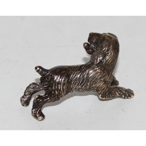 1174 - Italian 925 cast silver model of a Spaniel dog with bone, approx 33.8g gross