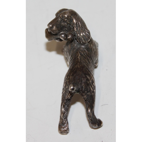 1174 - Italian 925 cast silver model of a Spaniel dog with bone, approx 33.8g gross