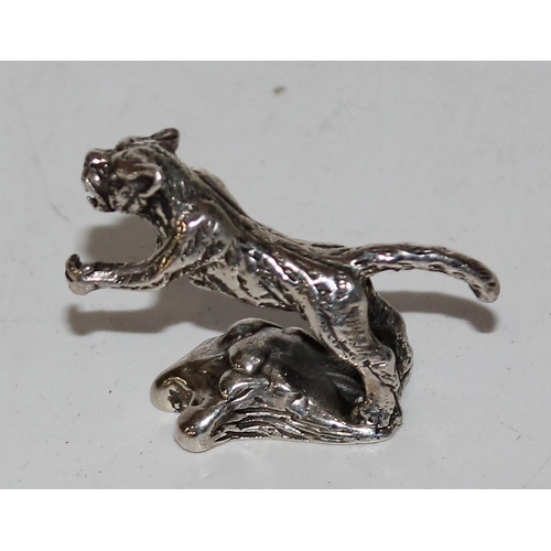 1175 - A 925 cast silver model of a rearing tiger, approx 12.9g gross