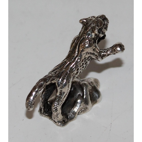 1175 - A 925 cast silver model of a rearing tiger, approx 12.9g gross