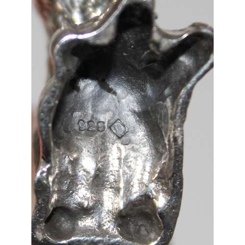 1175 - A 925 cast silver model of a rearing tiger, approx 12.9g gross