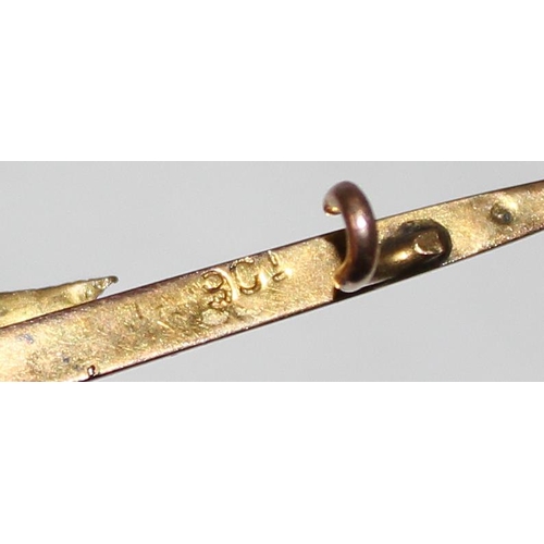 1233 - 9ct gold bar brooch formed with a swallow, approx 1.6g gross