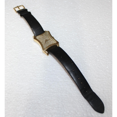 1416 - An Art Deco period Rodania watch with unusual concave cushion shaped dial, in gold plated case