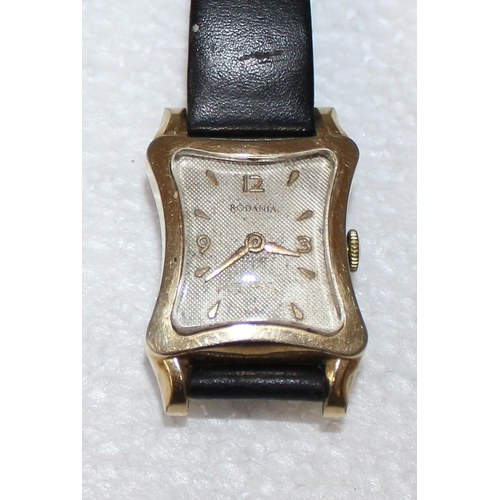 1416 - An Art Deco period Rodania watch with unusual concave cushion shaped dial, in gold plated case