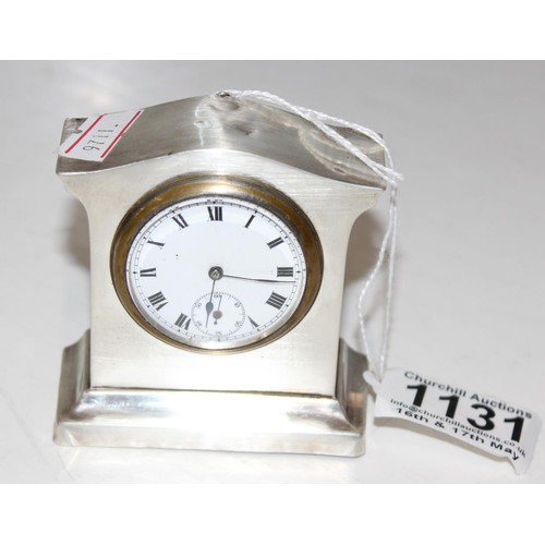 1131 - A small silver cased desk clock, Birmingham 1915 by Charles Green