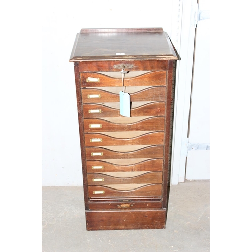 1 - An early 20th century oak tambour fronted cabinet, with key