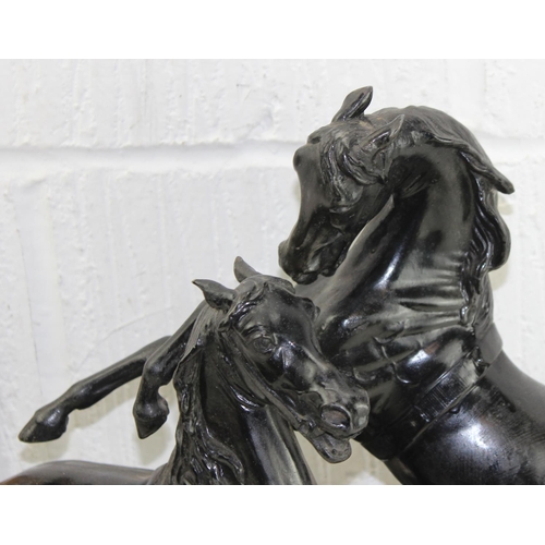 1701 - A large 19th century bronzed figure of rearing horses, indistinctly signed to reverse