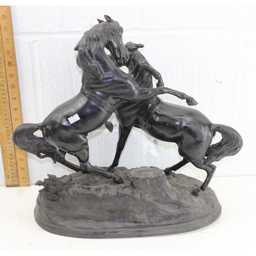 1701 - A large 19th century bronzed figure of rearing horses, indistinctly signed to reverse