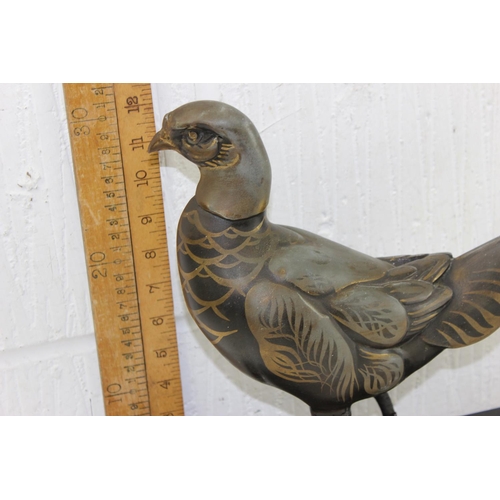 1702 - In the manner of Rene Papa, a large Art Deco style patinated bronze model of a pheasant on 2 step ba... 