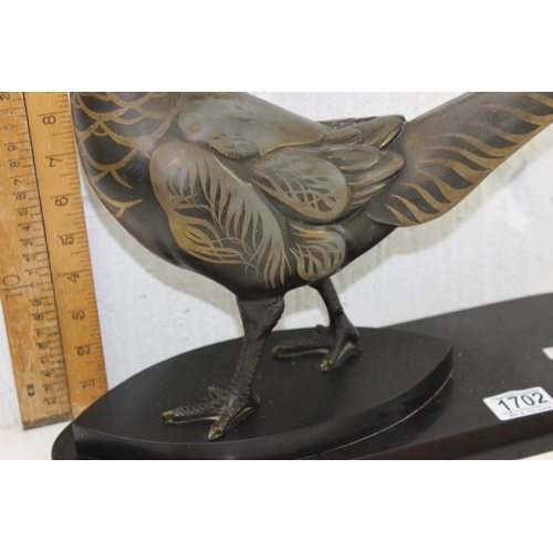 1702 - In the manner of Rene Papa, a large Art Deco style patinated bronze model of a pheasant on 2 step ba... 