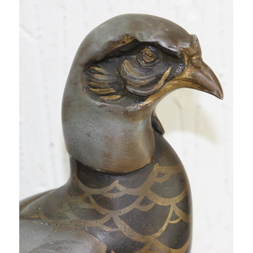 1702 - In the manner of Rene Papa, a large Art Deco style patinated bronze model of a pheasant on 2 step ba... 