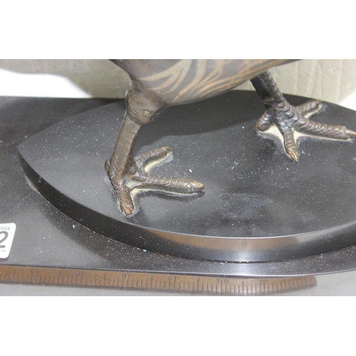 1702 - In the manner of Rene Papa, a large Art Deco style patinated bronze model of a pheasant on 2 step ba... 