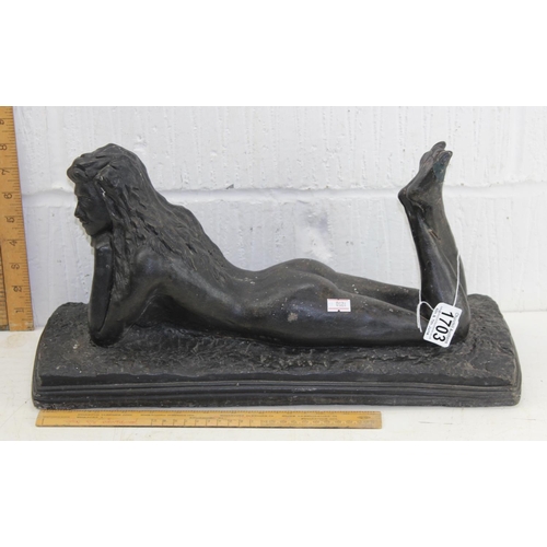 1703 - A large bronzed patinated figure of a recumbent nude female, unsigned