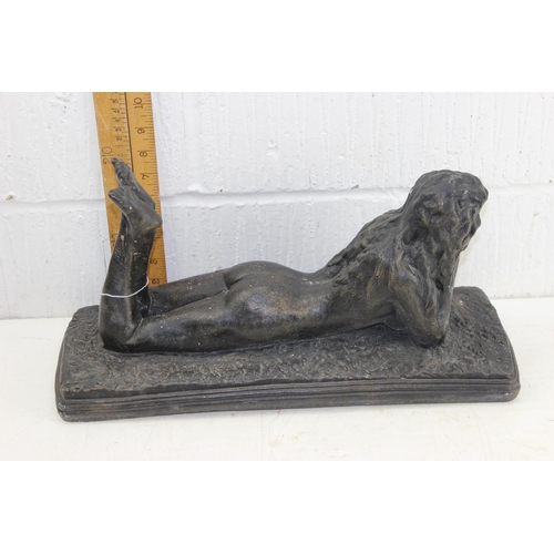 1703 - A large bronzed patinated figure of a recumbent nude female, unsigned