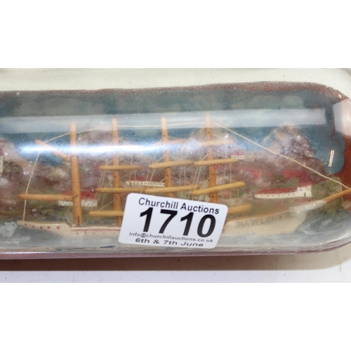 1710 - A vintage ship in bottle model, likely early 20th century