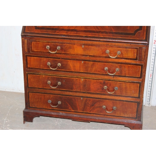 18 - An antique bureau bookcase with glazed top and brass drop handles