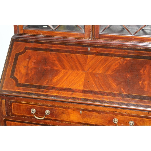 18 - An antique bureau bookcase with glazed top and brass drop handles