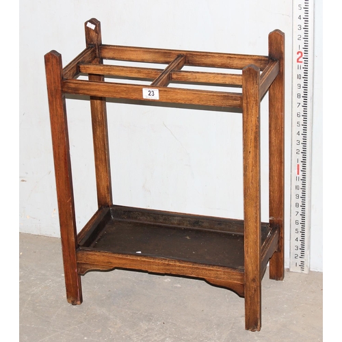 23 - Vintage oak 4 section stick stand with metal drip tray